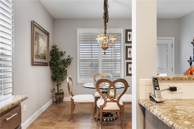 view of tiled dining space