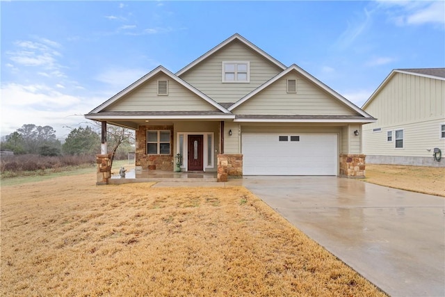 craftsman inspired home featuring a garage, a front lawn, and covered porch