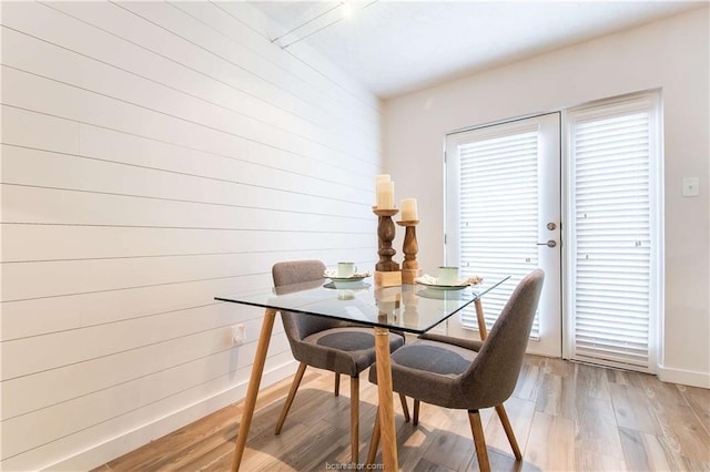 dining room featuring light hardwood / wood-style flooring