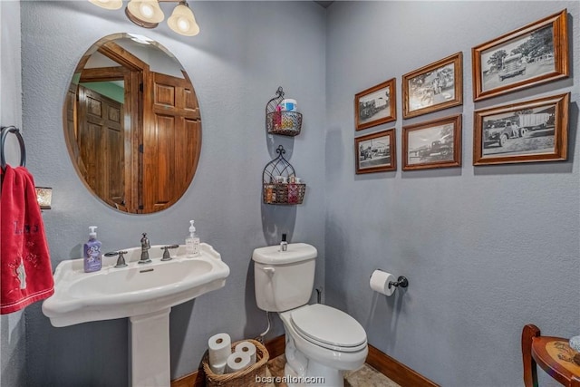 bathroom featuring toilet