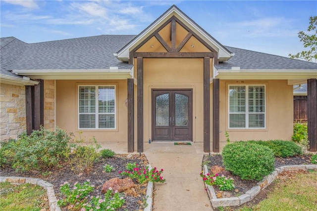 property entrance featuring french doors