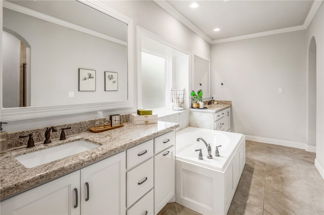 bathroom with a tub to relax in, vanity, and crown molding