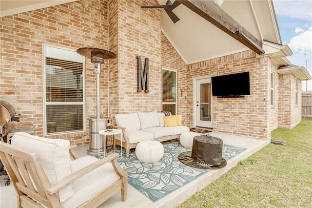 view of patio featuring an outdoor living space and ceiling fan