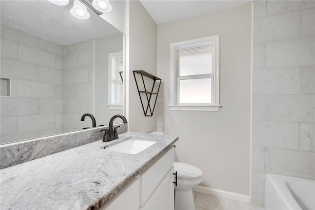 bathroom with tile patterned floors, vanity, and toilet