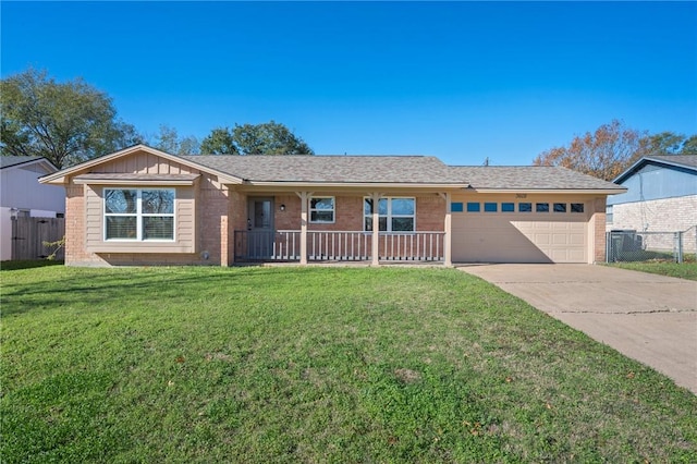 ranch-style home featuring a front lawn, a porch, and a garage