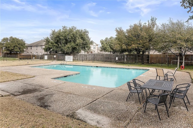 view of pool featuring a patio area