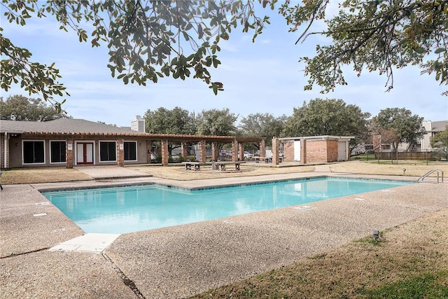 view of pool featuring a patio