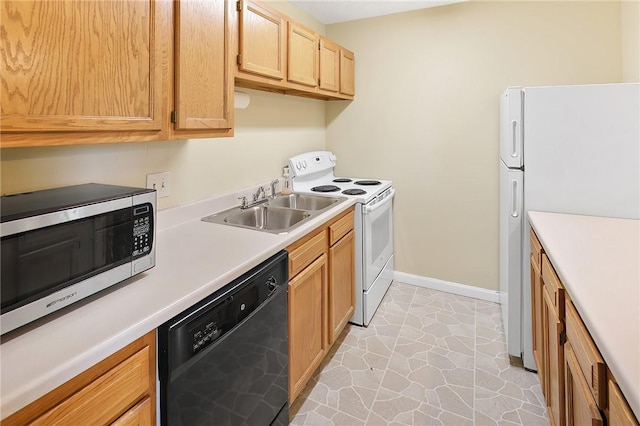 kitchen featuring white appliances and sink