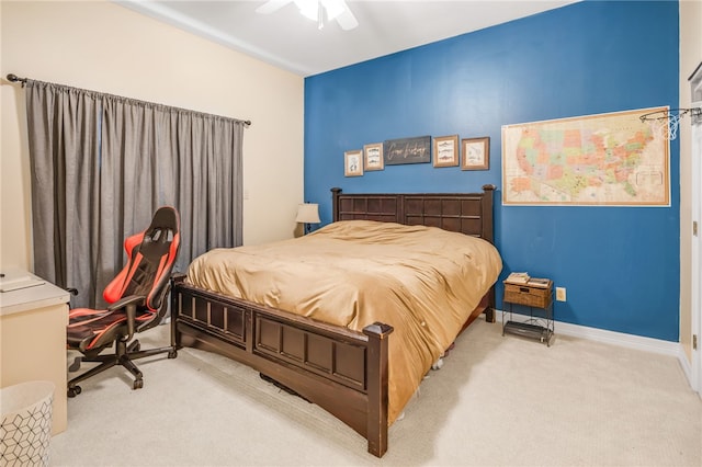 bedroom featuring baseboards, ceiling fan, and carpet flooring
