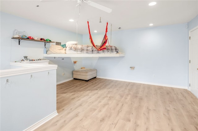 laundry area with recessed lighting, a ceiling fan, wood finished floors, and baseboards
