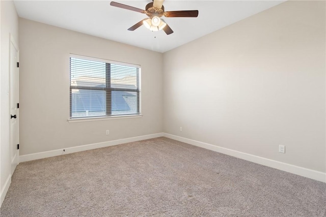 unfurnished room with carpet flooring and ceiling fan