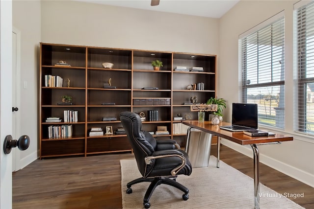 office with dark wood-type flooring