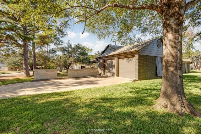 view of home's exterior with a garage and a lawn