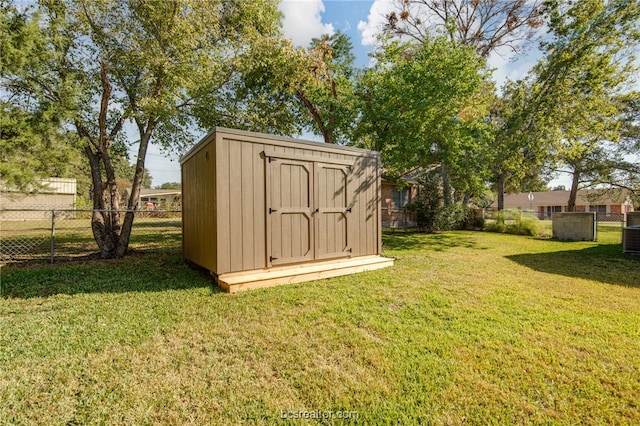 view of outdoor structure featuring a yard