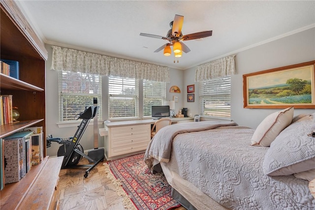 bedroom featuring light parquet flooring, ornamental molding, and multiple windows