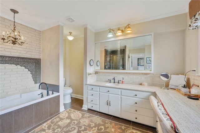 bathroom with crown molding, tile patterned floors, toilet, and backsplash