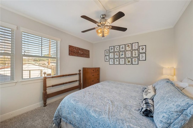 bedroom featuring crown molding, carpet, and ceiling fan