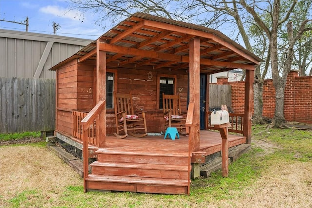 deck featuring a yard