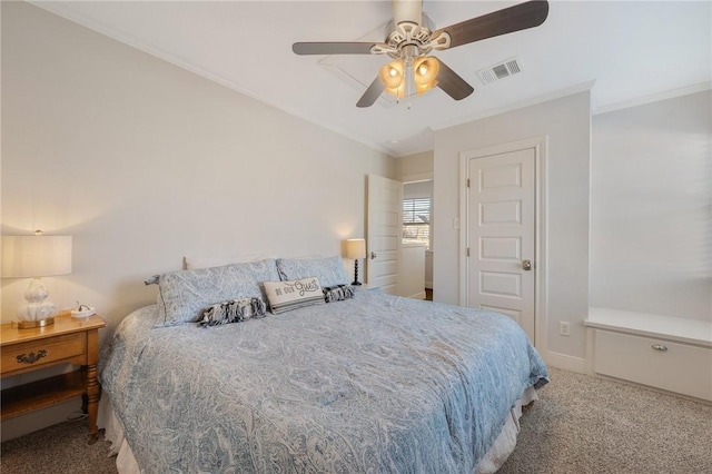 carpeted bedroom with ceiling fan and ornamental molding