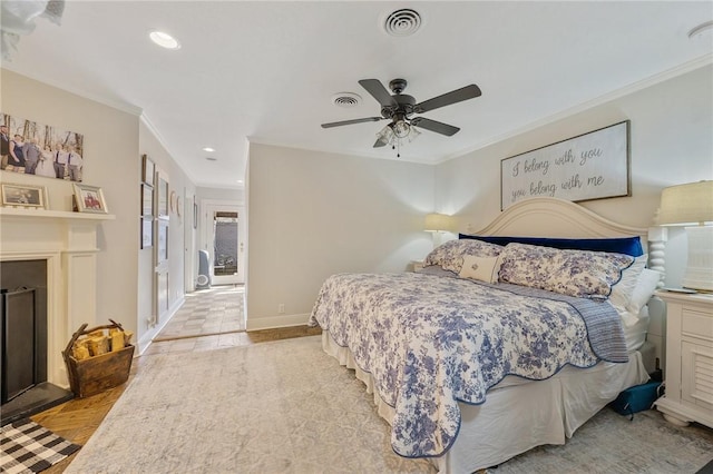 bedroom featuring ornamental molding and ceiling fan