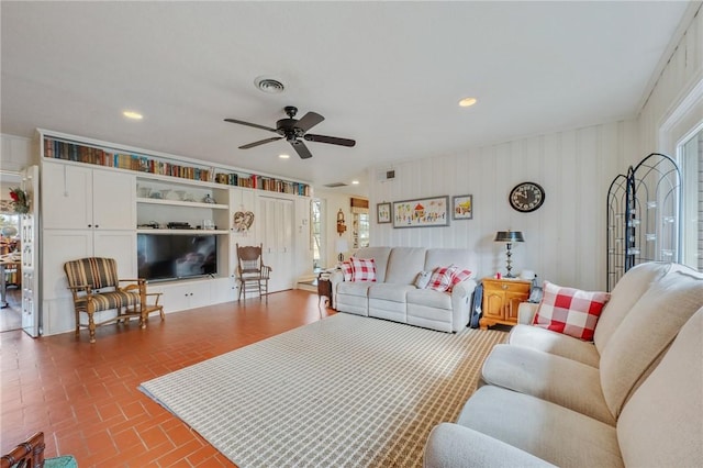 living room with ceiling fan