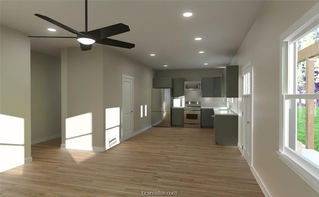 kitchen featuring ceiling fan, sink, light hardwood / wood-style floors, white appliances, and gray cabinets