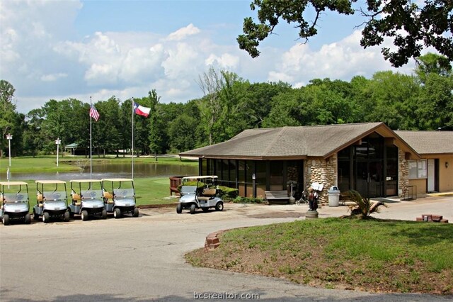 view of community featuring a yard