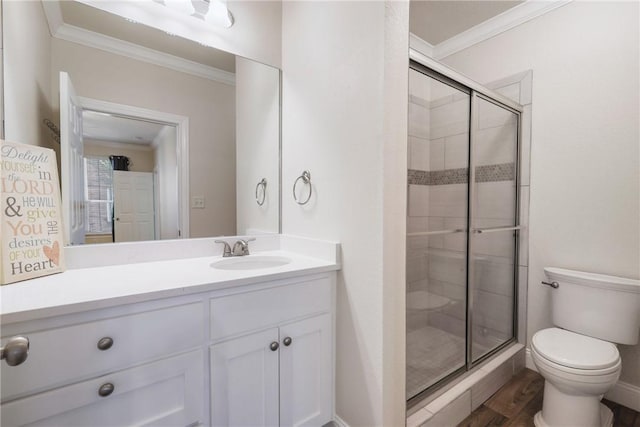 801 Luther St W Unit 307, College Station, TX 77840 - full bath with crown molding, toilet, a stall shower, vanity, and wood finished floors