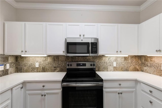 801 Luther St W Unit 307, College Station, TX 77840 - kitchen featuring stainless steel microwave, electric range, crown molding, and white cabinetry