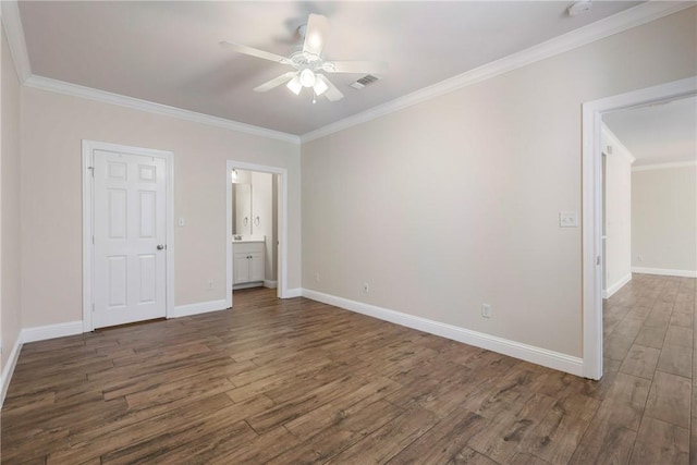 801 Luther St W Unit 307, College Station, TX 77840 - unfurnished bedroom featuring dark wood finished floors, ornamental molding, baseboards, ensuite bath, and a ceiling fan