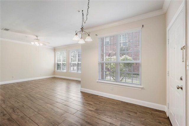 801 Luther St W Unit 307, College Station, TX 77840 - unfurnished dining area with ornamental molding, dark wood-style flooring, baseboards, and a ceiling fan