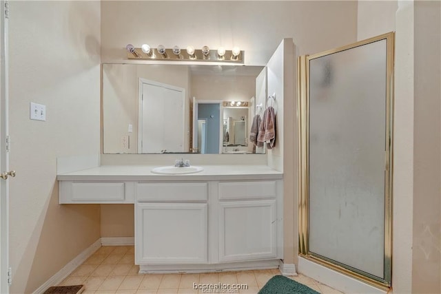 2308 Carnation Ct, College Station, TX 77840 - bathroom featuring a shower stall, vanity, and tile patterned floors