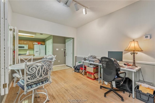2308 Carnation Ct, College Station, TX 77840 - office space featuring rail lighting and light wood finished floors