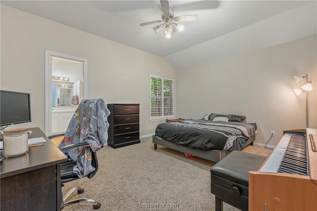 2308 Carnation Ct, College Station, TX 77840 - bedroom featuring carpet floors, lofted ceiling, baseboards, a desk, and ensuite bathroom