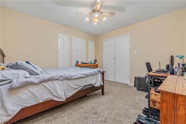 2308 Carnation Ct, College Station, TX 77840 - bedroom with light colored carpet, an office area, a ceiling fan, and baseboards