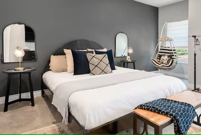 301 W 31st St Unit 103, Bryan, TX 77803 - bedroom with baseboards