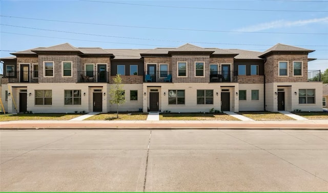 301 W 31st St Unit 103, Bryan, TX 77803 - view of front facade featuring brick siding