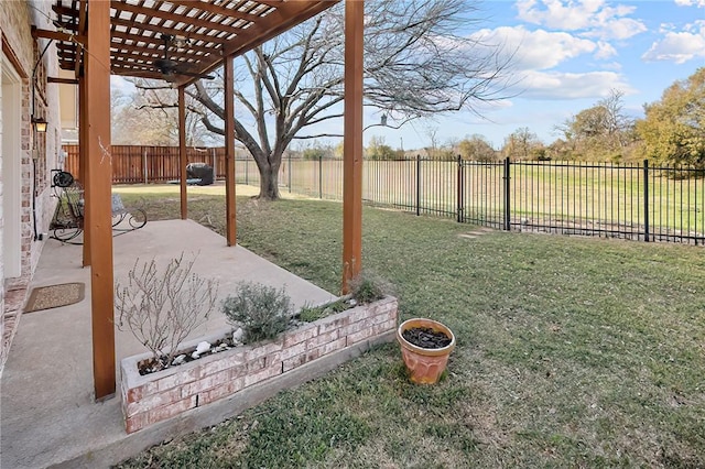 view of yard with a pergola and a patio area