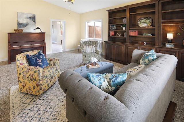 living room with light carpet, ceiling fan, and lofted ceiling