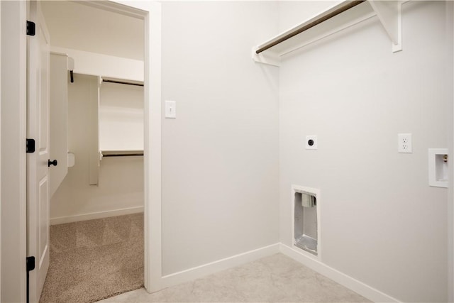 washroom featuring light colored carpet, washer hookup, and electric dryer hookup