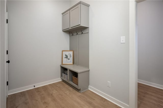 mudroom with light hardwood / wood-style flooring