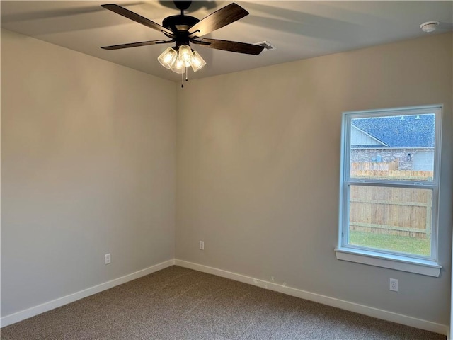 unfurnished room featuring carpet floors and ceiling fan