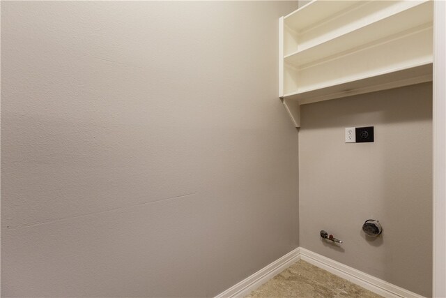 clothes washing area with hookup for an electric dryer and hookup for a gas dryer