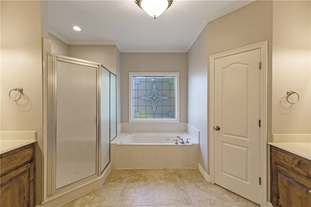 bathroom with vanity, crown molding, and independent shower and bath