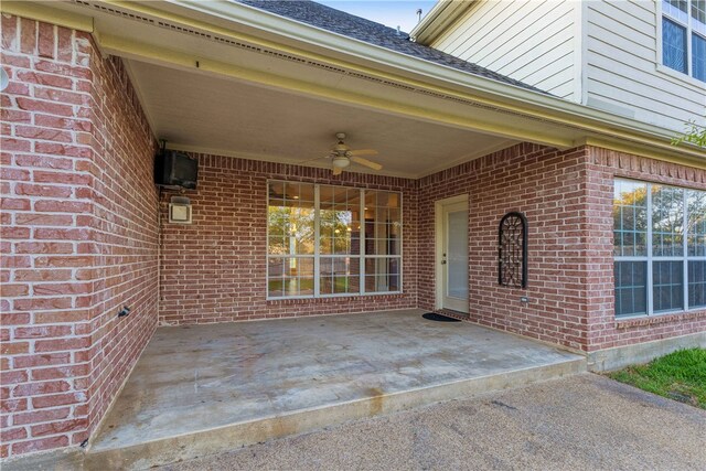 view of patio with ceiling fan