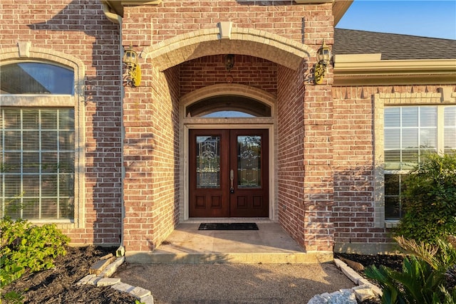 entrance to property featuring french doors