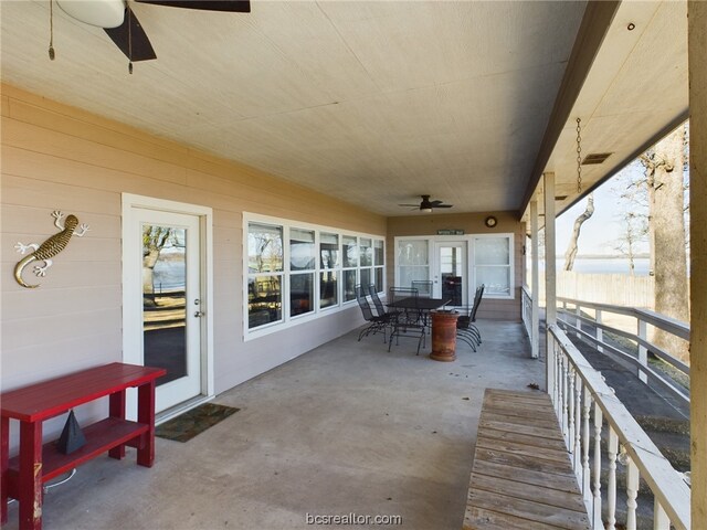 view of patio / terrace featuring ceiling fan