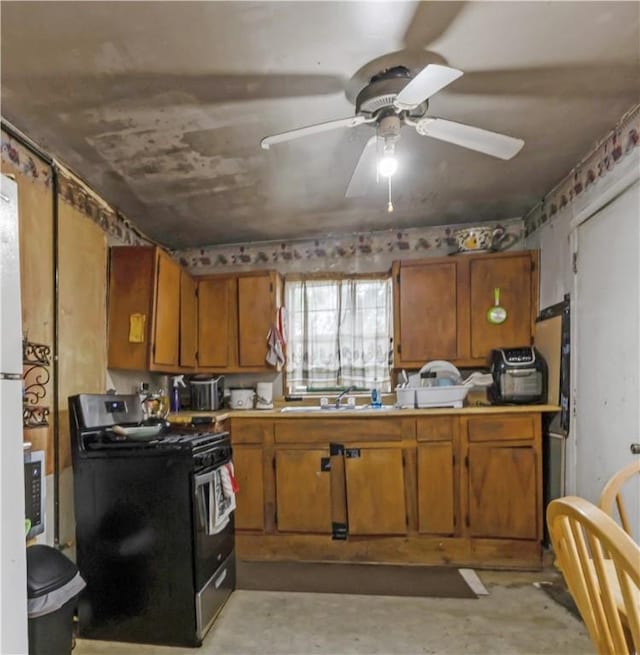 905 N Parker Ave, Bryan, TX 77803 - kitchen featuring range with gas cooktop, brown cabinets, unfinished concrete flooring, light countertops, and a ceiling fan