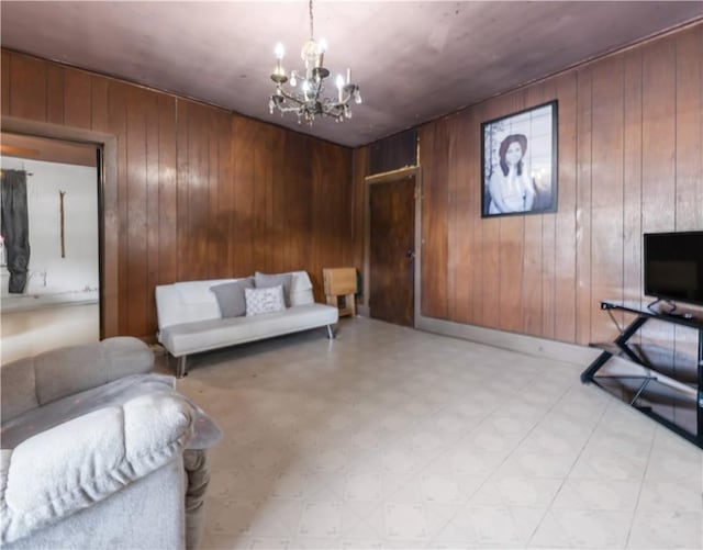 905 N Parker Ave, Bryan, TX 77803 - living area with light flooring, a chandelier, and wood walls