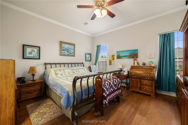 934 Dove Landing Ave, College Station, TX 77845 - bedroom with crown molding, a ceiling fan, wood finished floors, and visible vents